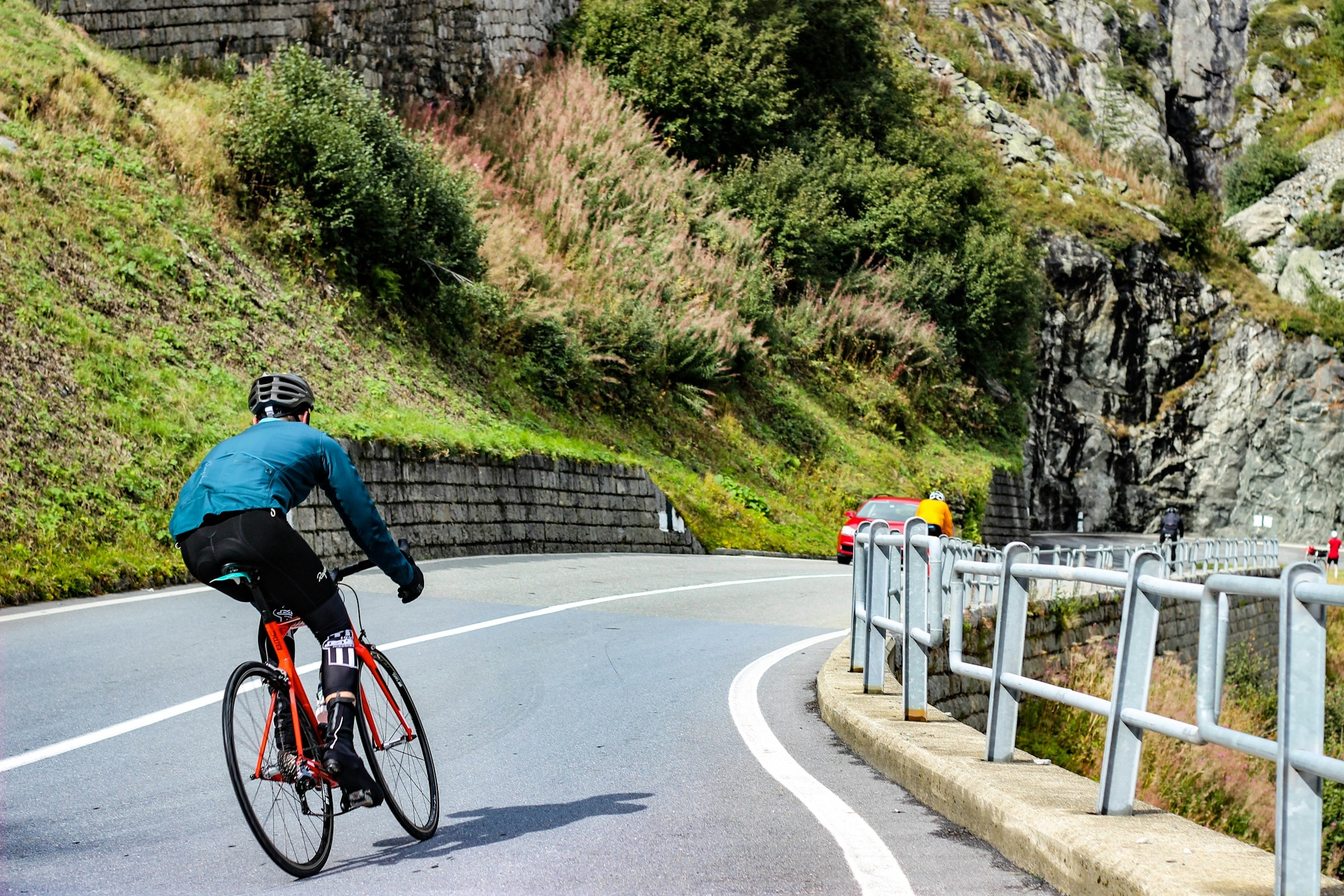Cyclist riding on an open road